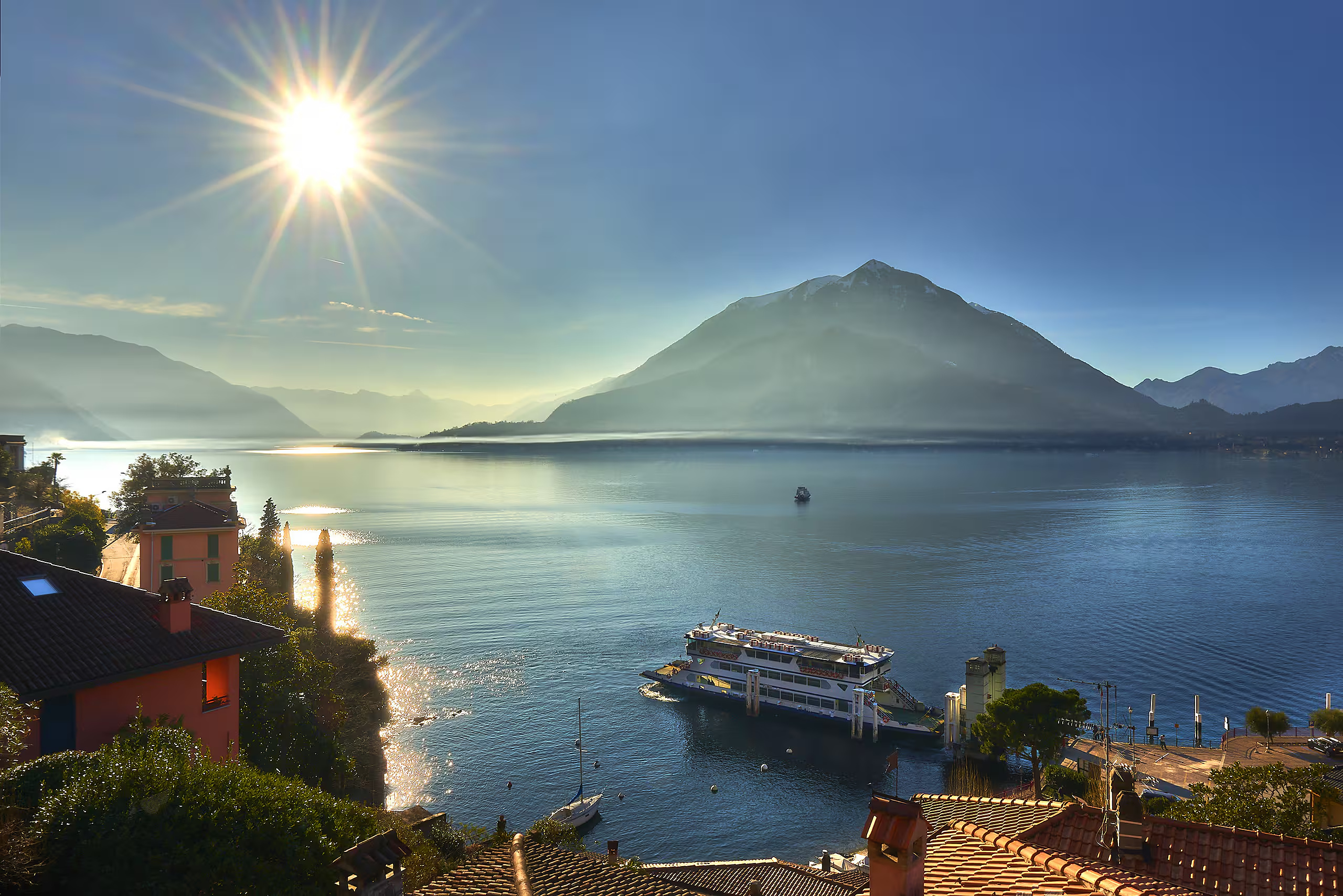 Panoramic daytime view across Lake Como from Sweet Escape